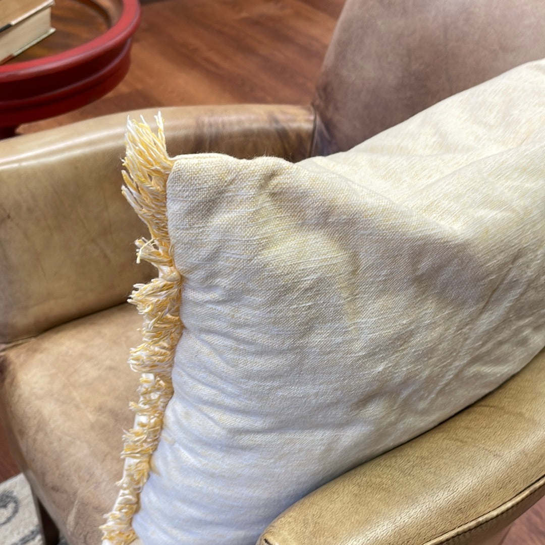 Yellow fringe pillow