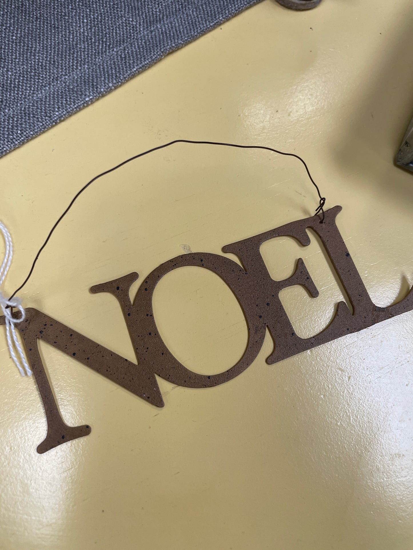 Noel metal sign