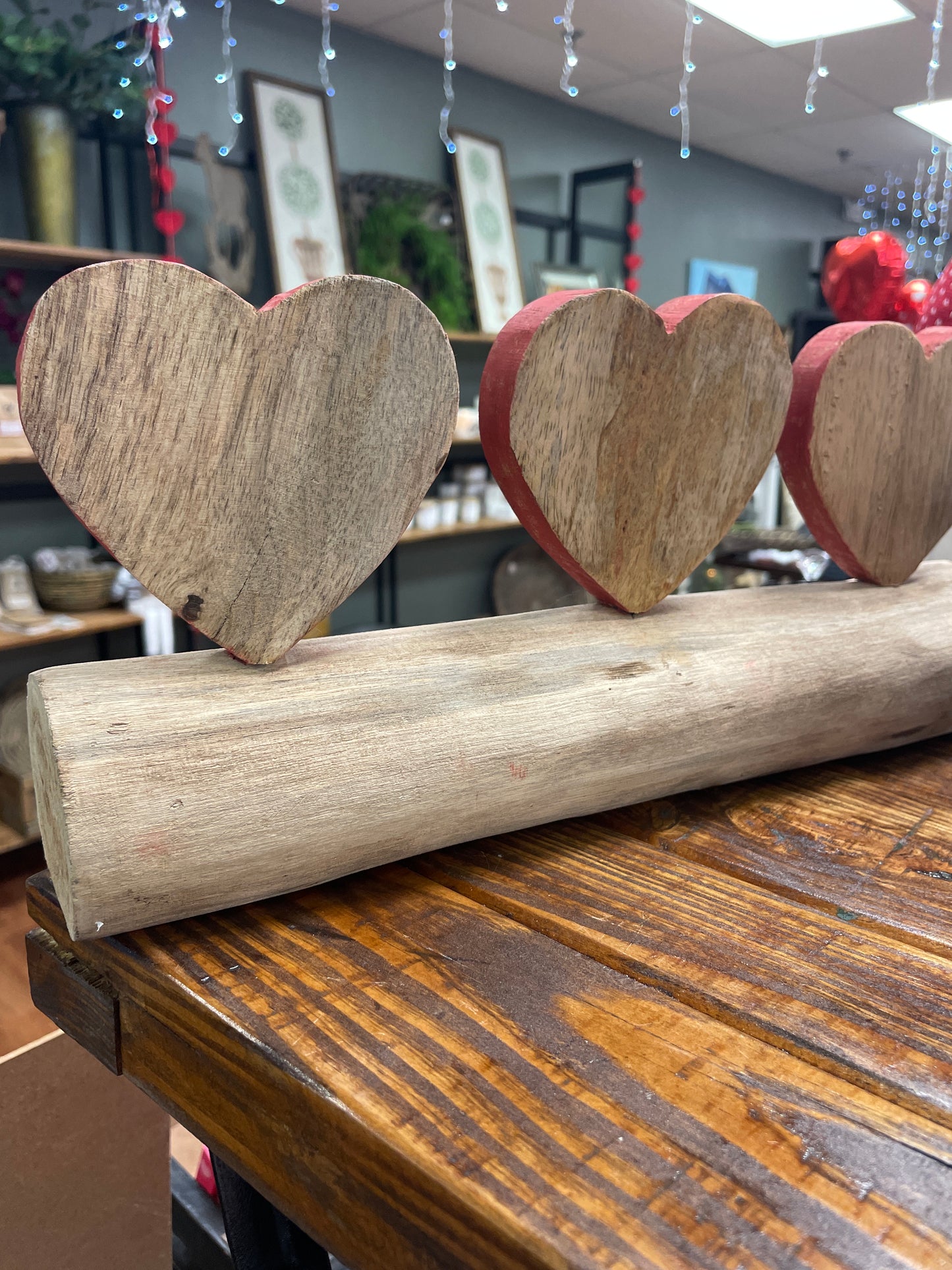 LOVE sign on log